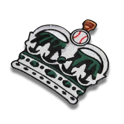 Crown shaped embroidered patch with heat cut border