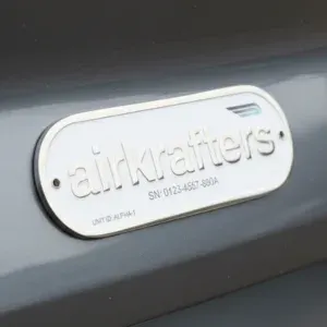 aircraft metal emblem on side of vehicle