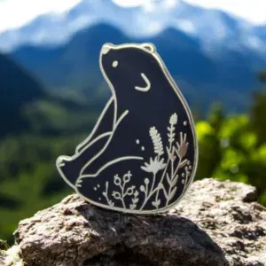 Custom hard enamel bear-shaped lapel pin in antique gold finish