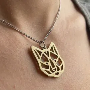 Custom gold geometric animal charm worn on chain necklace