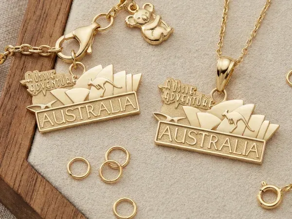Custom gold Australia charms featuring Sydney Opera House design on chain necklaces
