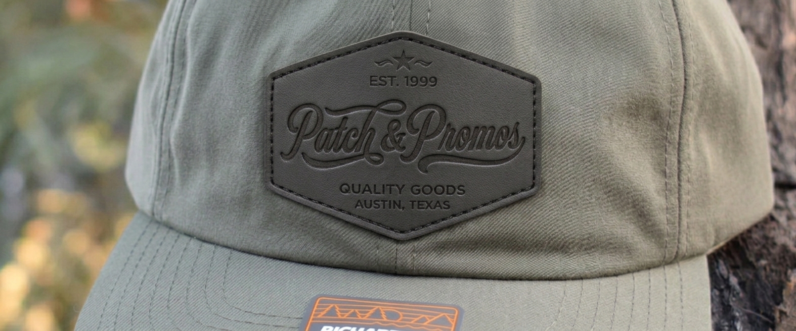 Custom Richardson hat in sage green with embossed leather Patch & Promos patch